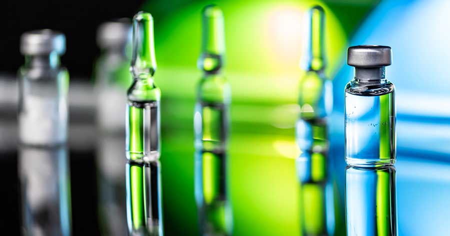 Glass ampoules backlit with colourful lights