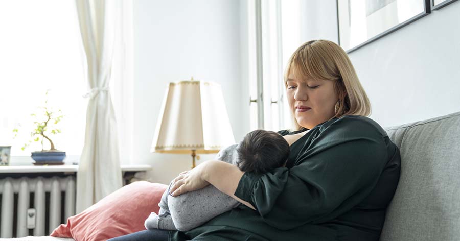 Mother breastfeeding baby