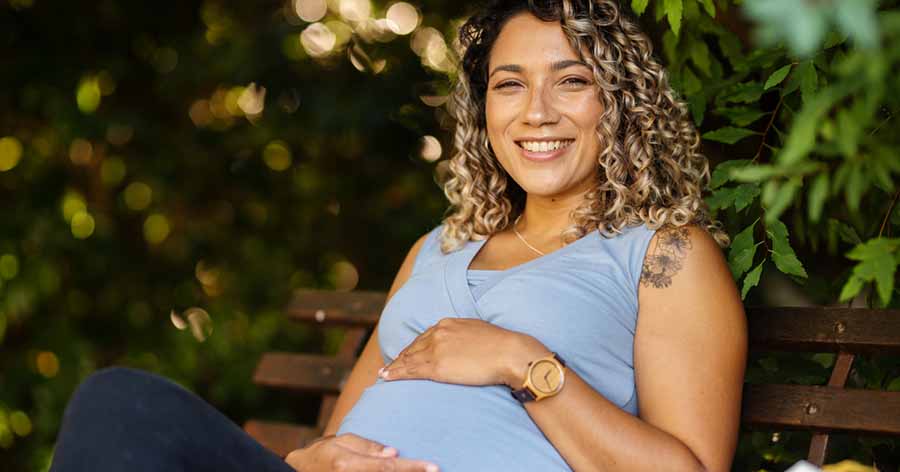 Pregnant woman smiling